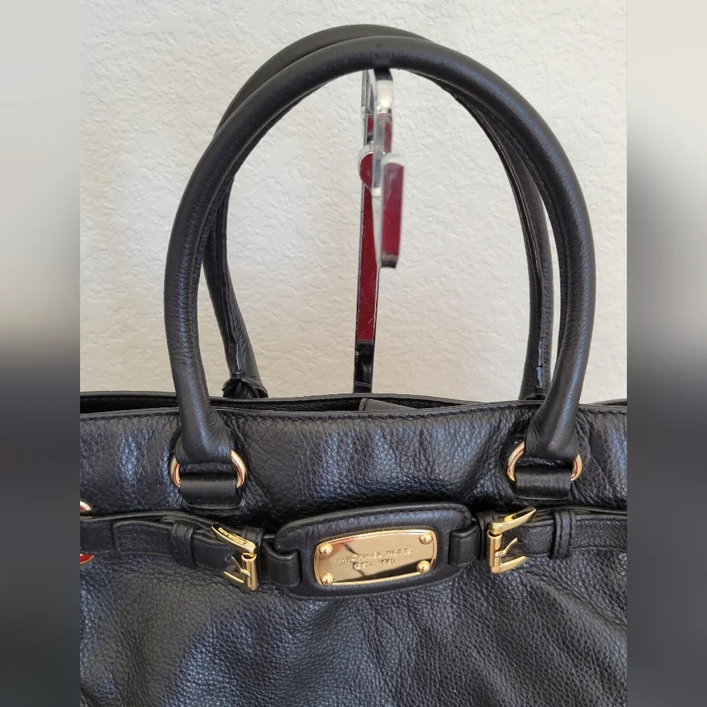 Michael Kors good larger